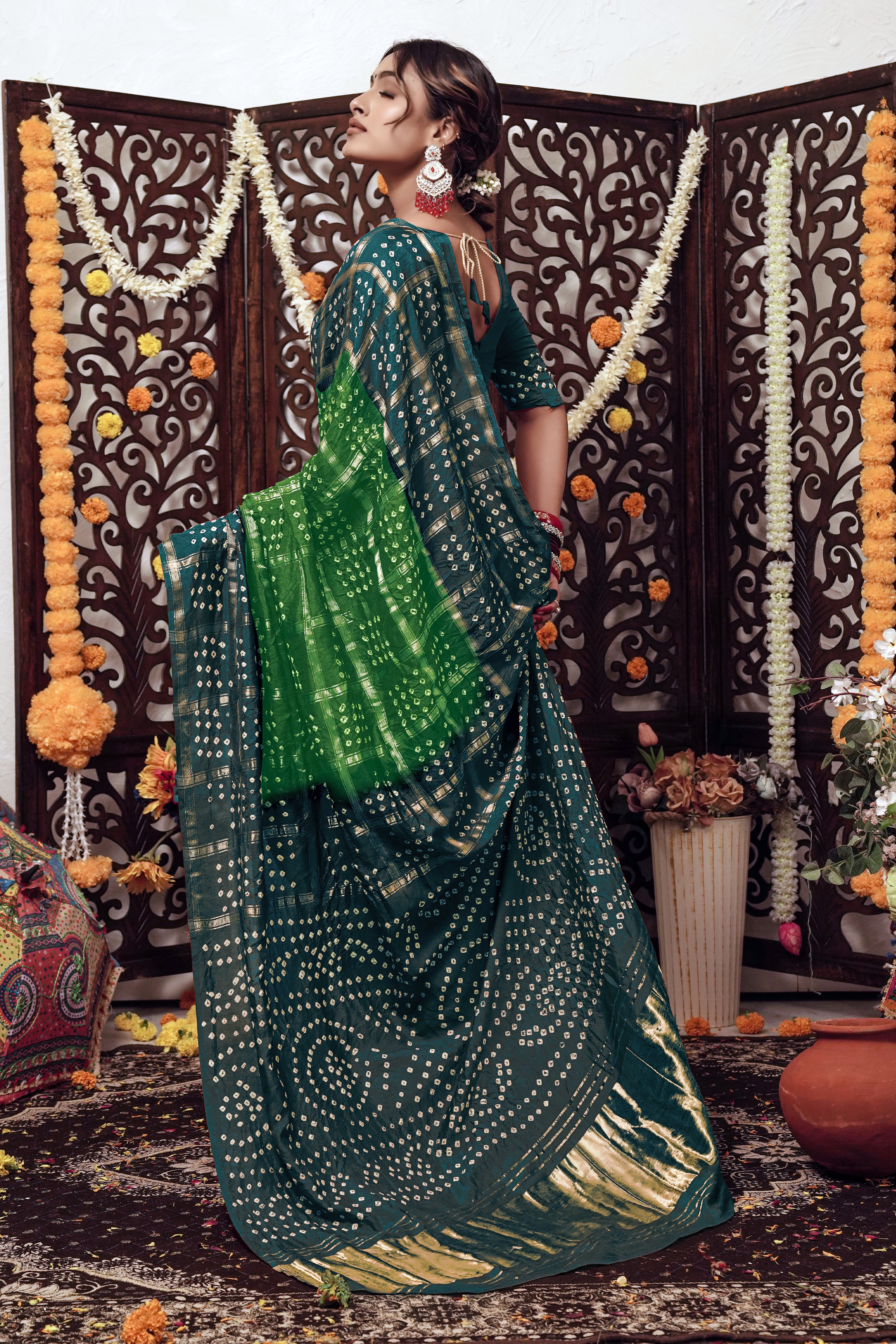 Parrot’s Poise Dola Silk Bandhani Saree